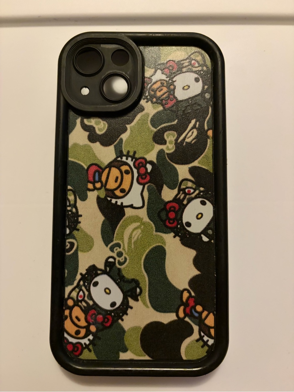 IPhone 13 Hello Kitty Camouflage Phone Case - Green